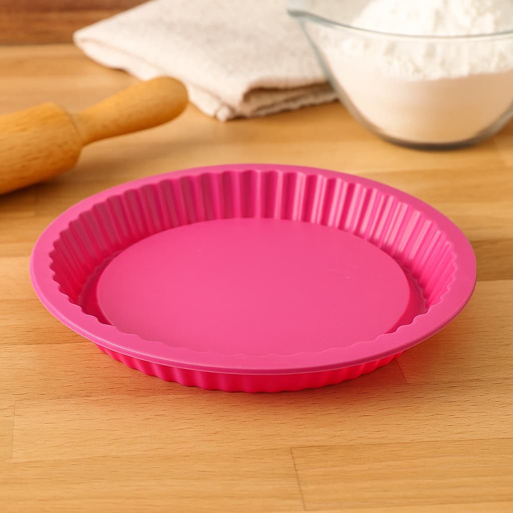 Molde de silicona Press para pie 24 cm rosa con borde estriado.