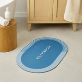 Tapete de baño ovalado azul 40×60 cm “BATHROOM” vista frontal