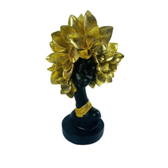 Figura decorativa de mujer africana con tocado floral dorado