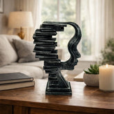 Escultura decorativa rostro abstracto negro diseño geométrico escalonado