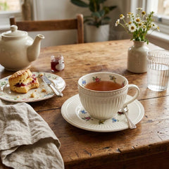 Set de té en porcelana con pocillo y plato diseño flores multicolor