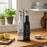 Set de aceitera blanca y vinagrera negra 500 ml con soporte metálico