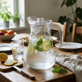 Jarra de vidrio transparente 1.3 L con tapa diseño liso