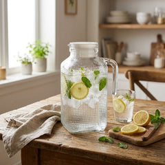 Jarra de vidrio transparente 1.6 L con tapa y diseño texturizado