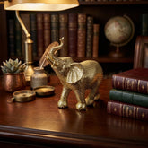 Figura decorativa elefante dorado de 17 cm con diseño de cuadros en relieve