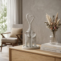 Pareja de elefantes decorativos blancos 30×10 cm con trompas formando corazón
