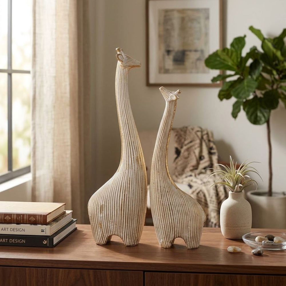 Set de 2 figuras decorativas de jirafas doradas con líneas blancas de 31 cm