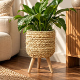 Matera redonda tejida beige con soporte en madera