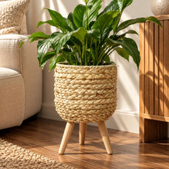 Matera redonda tejida beige con soporte en madera
