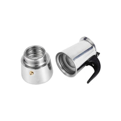 Cafetera moka plateada con asa negra