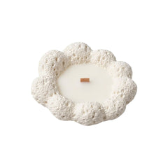 Vela artesanal en forma de flor color blanco crema