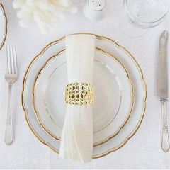 Anillo para servilleta dorado con diseño calado zig zag