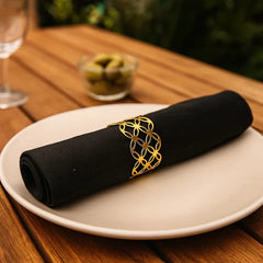 Anillos para servilleta dorados con diseño de x