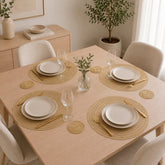 Individual para mesa redondo de 36 cm en PVC dorado con portavaso y diseño de círculos