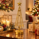 Árbol navideño decorativo dorado con luces, estrellas y base redonda.