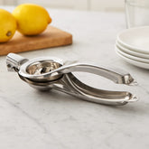 Exprimidor manual de limón en acero inoxidable ergonómico