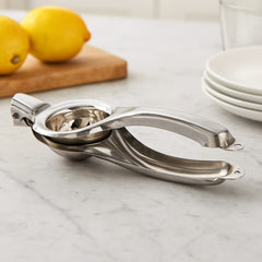 Exprimidor manual de limón en acero inoxidable ergonómico