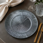 Plato base decorativo de melamina plateado 33 cm con diseño destello radial
