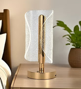 Lámpara de escritorio LED diseño escarchado de 22 cm con base dorada y botón táctil de 4 colores