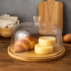 Tapa tortera redonda de vidrio transparente con base de bambú natural de 30 cm.