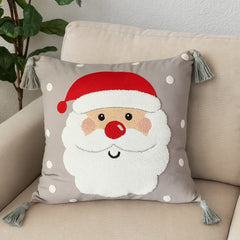 Detalle de rostro de Santa Claus en cojín decorativo