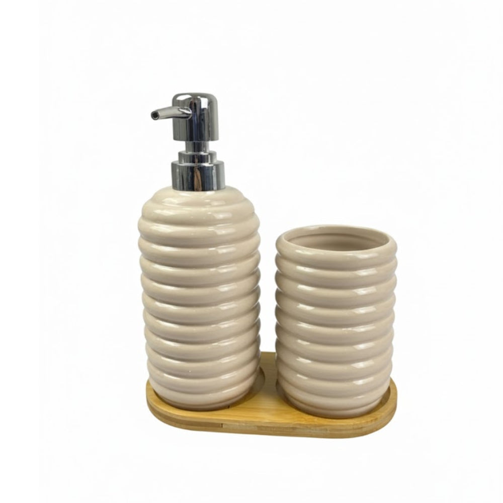 Set de baño beige con dispensador y vaso de cerámica