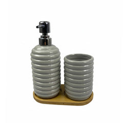 Dispensador y vaso cerámico con líneas horizontales en bandeja