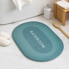 Tapete de baño ovalado verde oscuro 40×60 cm “BATHROOM” vista frontal