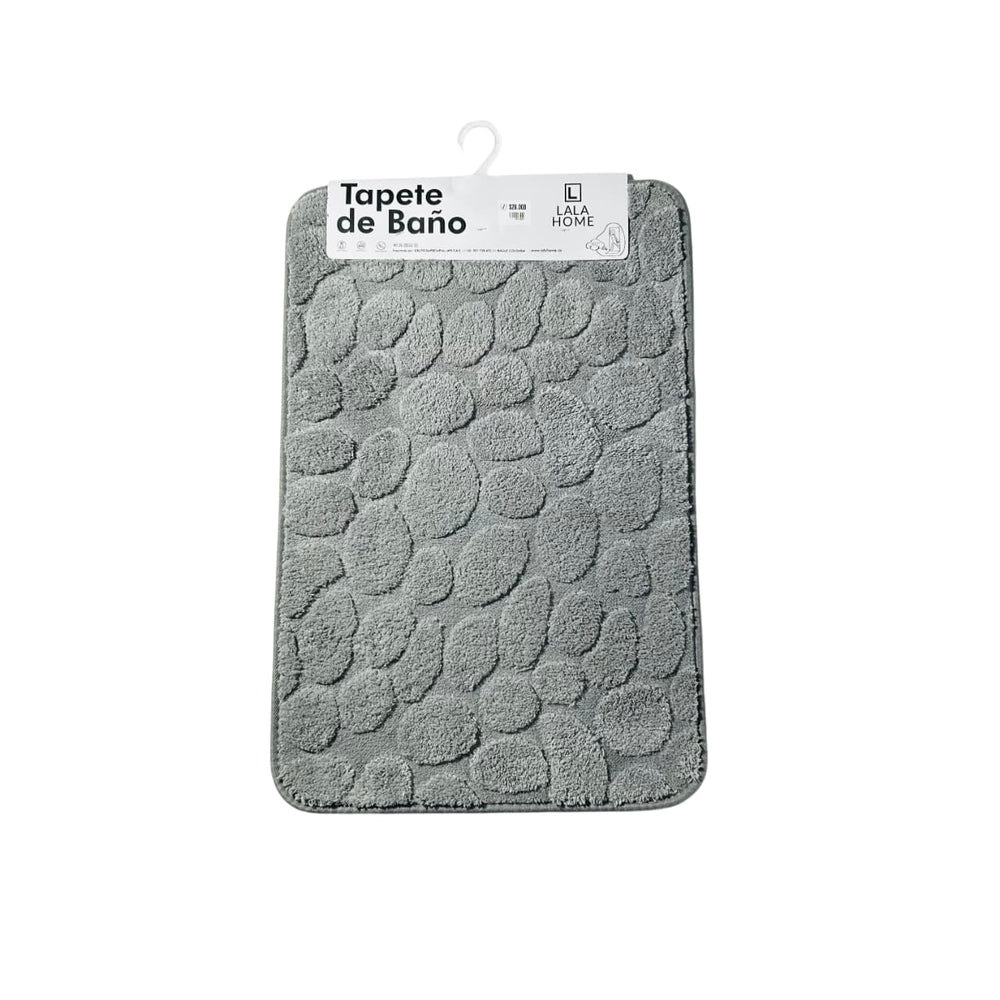 Detalle del diseño de círculos en tapete de baño 40×60 cm