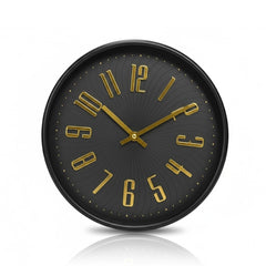 Reloj decorativo con textura espiral y detalles dorados