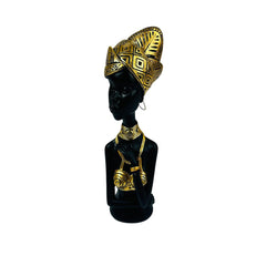 Figura decorativa africana con turbante dorado
