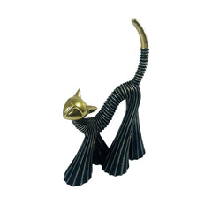 Gato decorativo negro con detalles dorados moderno
