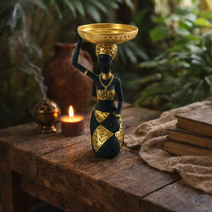 Figura decorativa mujer africana con bandeja en la cabeza negro y dorado