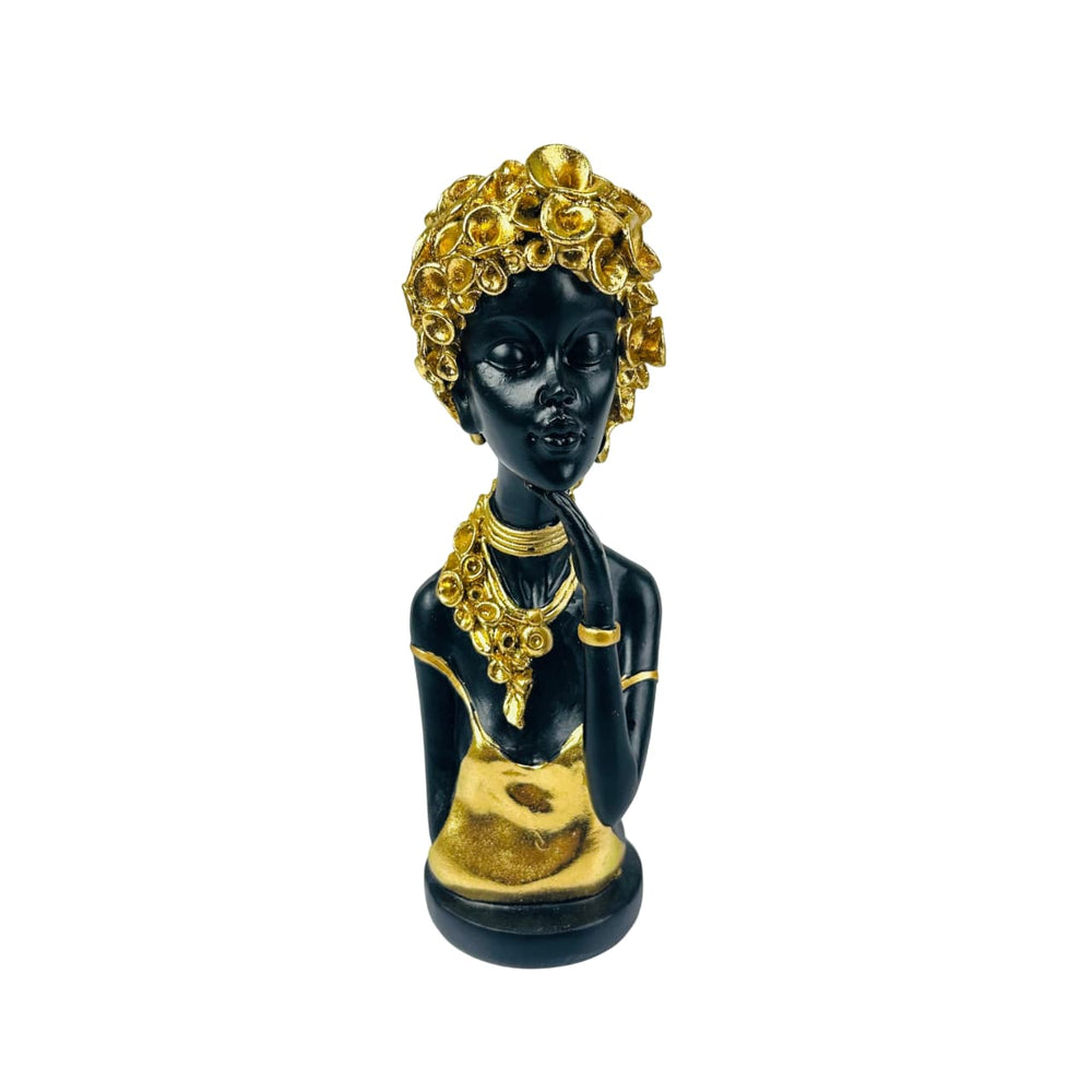 Figura decorativa africana con tocado floral dorado
