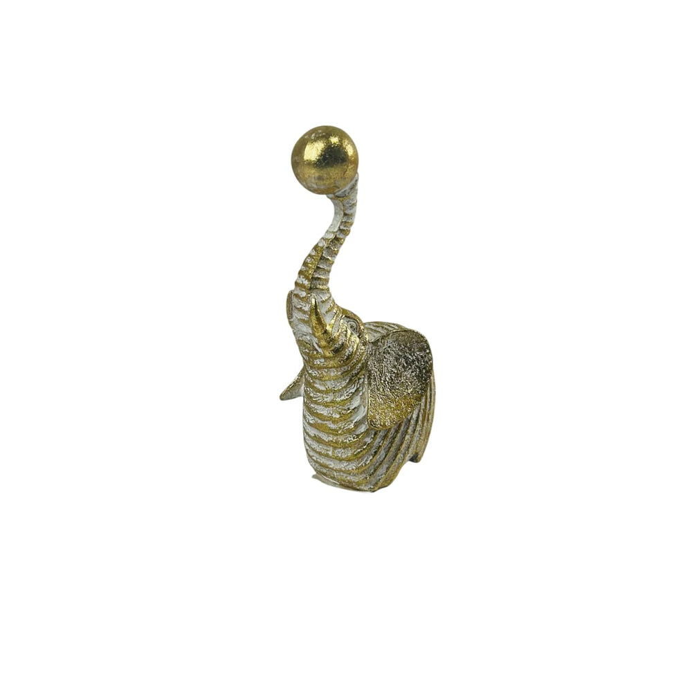 Figura de elefante con trompa levantada