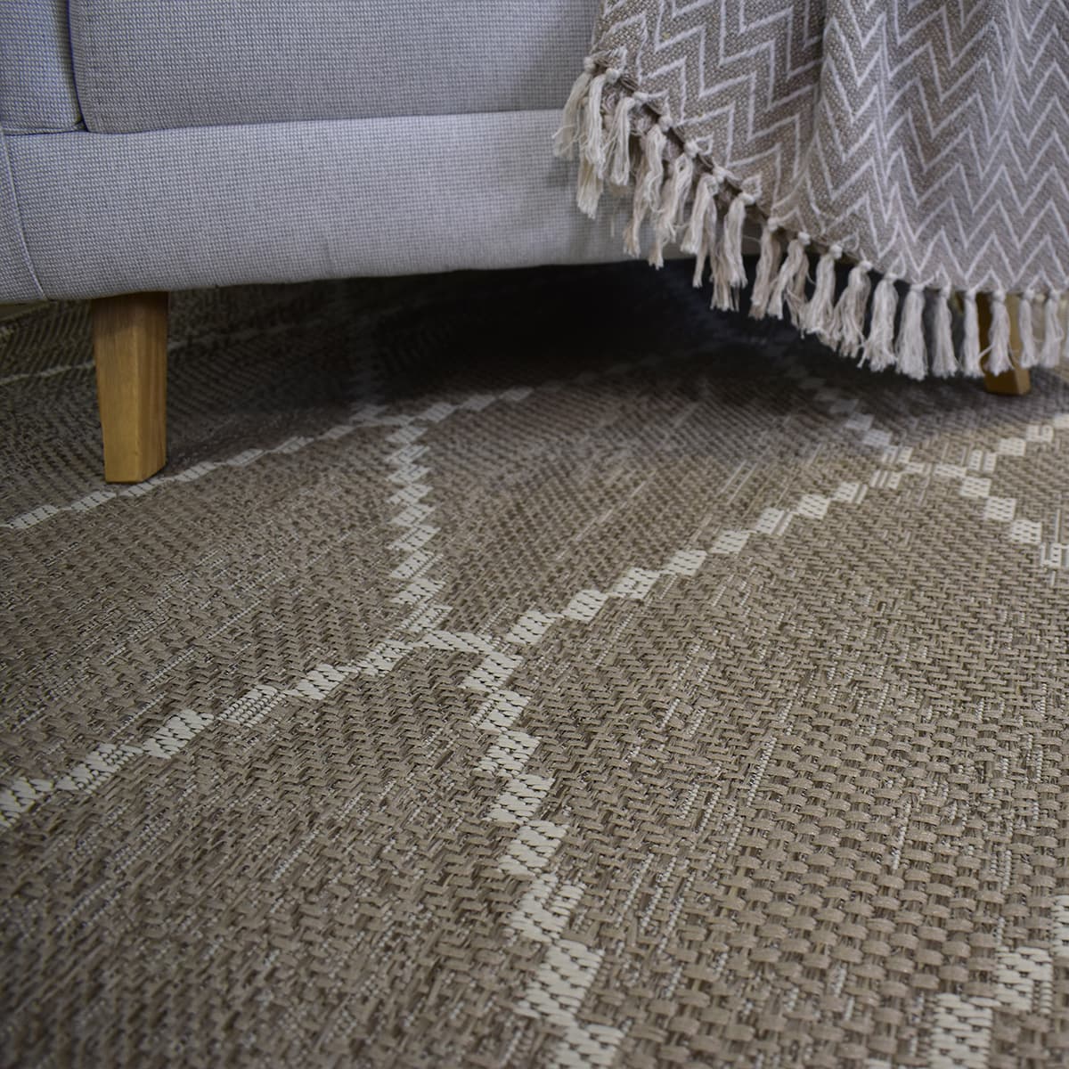 Alfombra beige con rombos