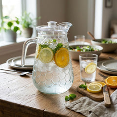 Jarra de vidrio transparente 1.3 L con tapa diseño escamas