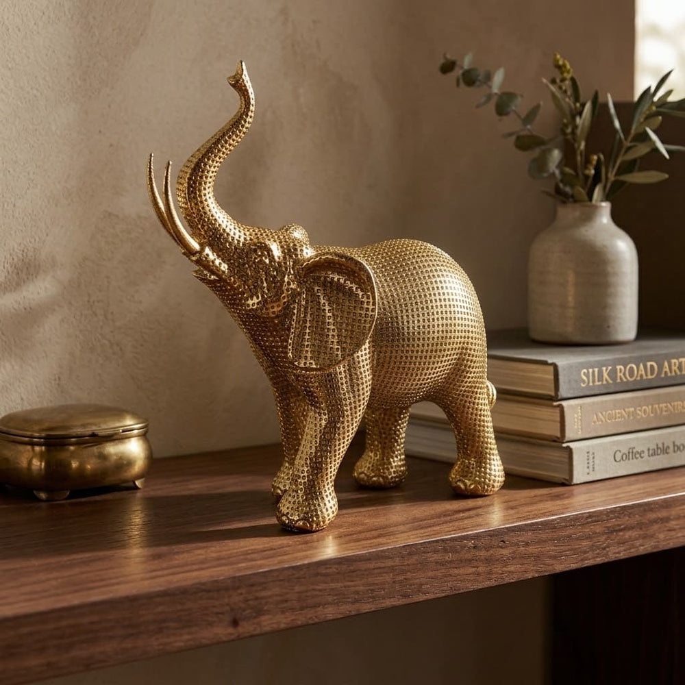 Figura decorativa elefante dorado de 26 cm con diseño de cuadros en relieve