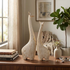 Set de 2 figuras decorativas de jirafas doradas con líneas blancas de 31 cm