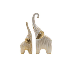 Set de dos elefantes decorativos dorados con detalles blancos