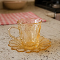 Set de té con taza y plato en vidrio diseño rombos color naranja