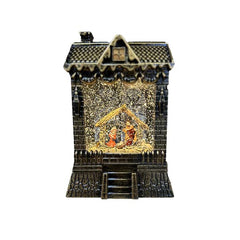Cabaña navideña con pesebre, luz y efecto de nieve