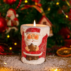 Vela navideña plateada de Papá Noel con estrella dorada y escarcha multicolor