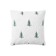 Cojín navideño blanco 45×45 cm con diseño de árboles verdes bordados.