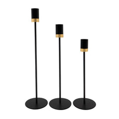 Set de candelabros cilíndricos metálicos negros con borde dorado