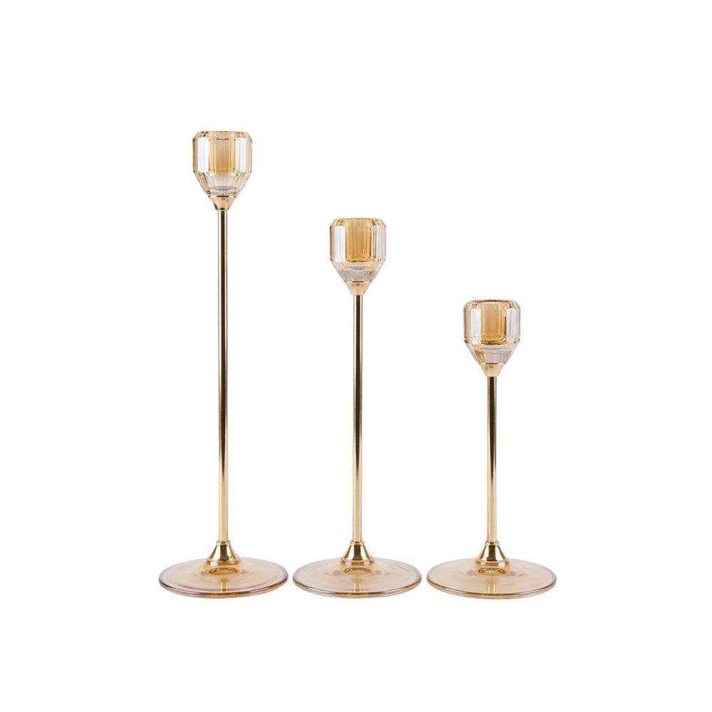 Set de tres candelabros en cristal ámbar de diferentes alturas