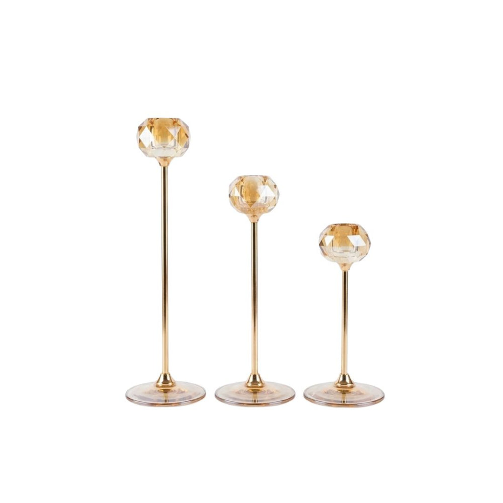 Set de tres candelabros circulares ámbar de diferentes alturas