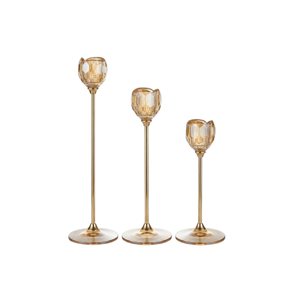 Set de tres candelabros en cristal ámbar con diseño flor