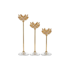 Set de tres candelabros en cristal ámbar con diseño Flor de Loto