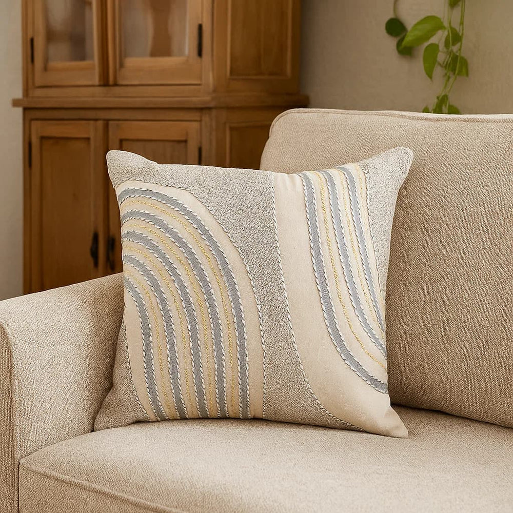 Cojín decorativo Elite Luminaria 45x45 cm con diseño texturizado en tonos beige, gris y azul